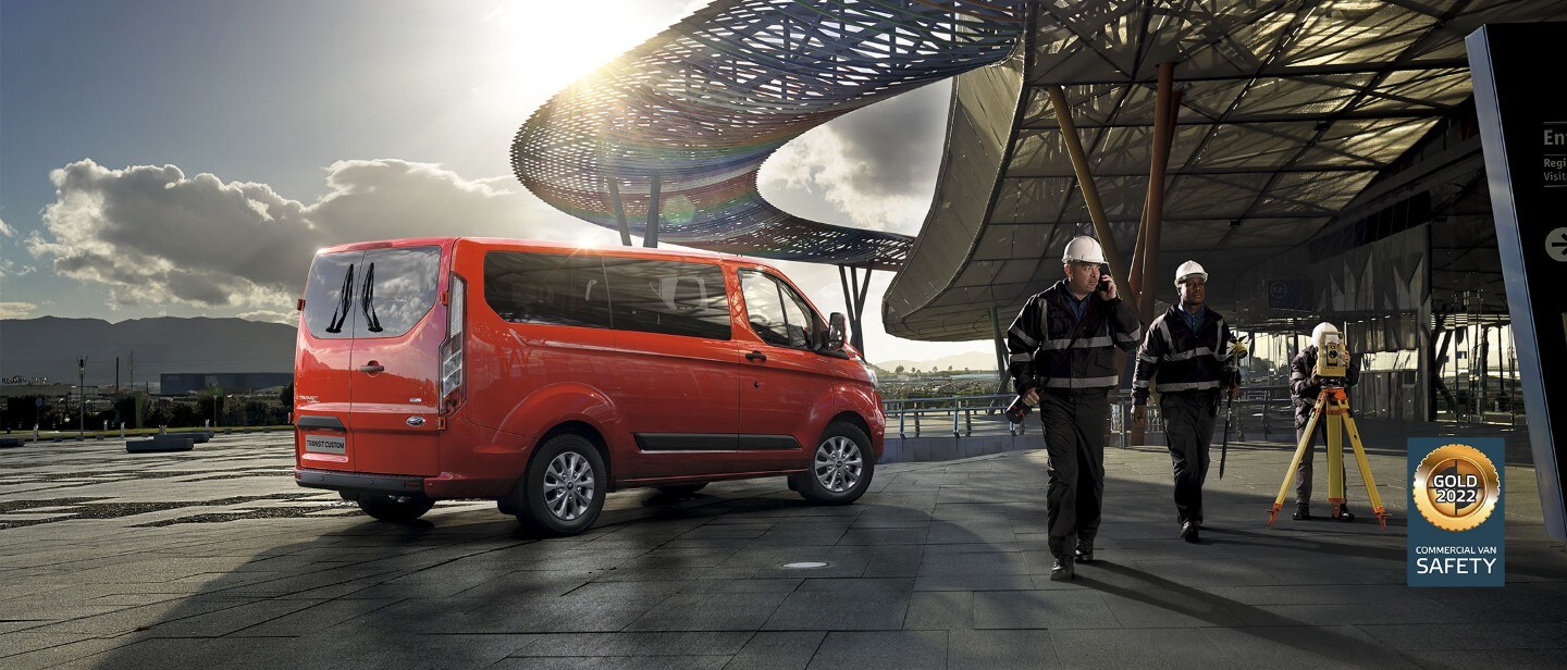New Red Ford Transit Custom at construction site