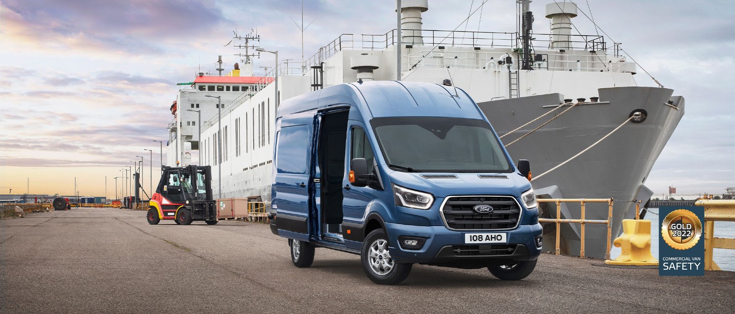 Blue Ford Transit Van parked outside ship