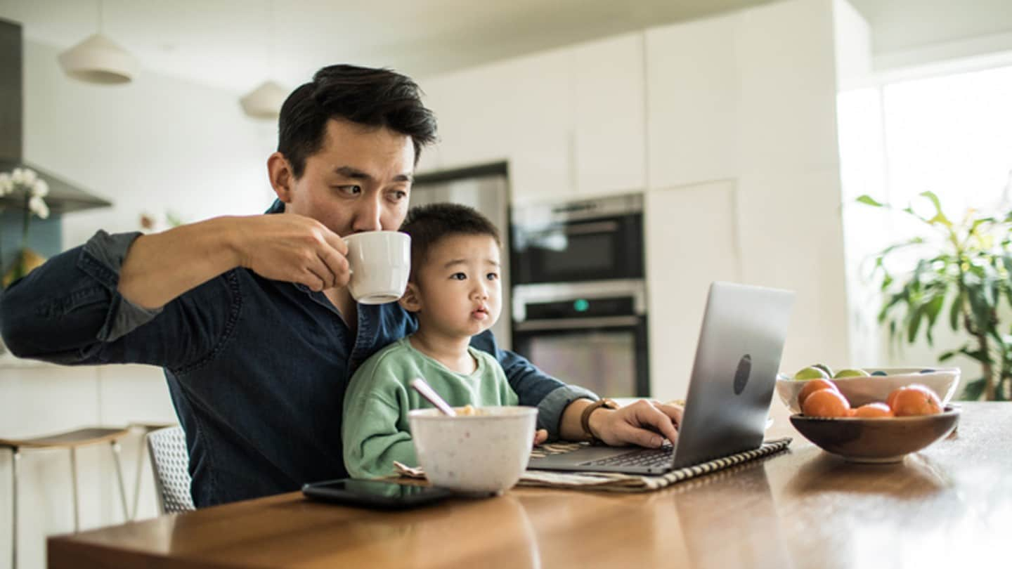 Man looking at online Ford account on a laptop