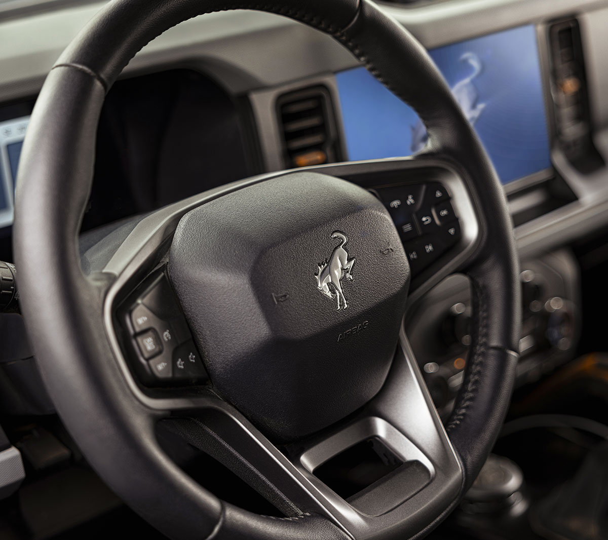 Ford Bronco heated leather steering wheel close-up