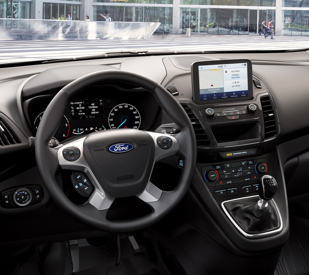 Interior do Ford Transit Connect, volante e SYNC3