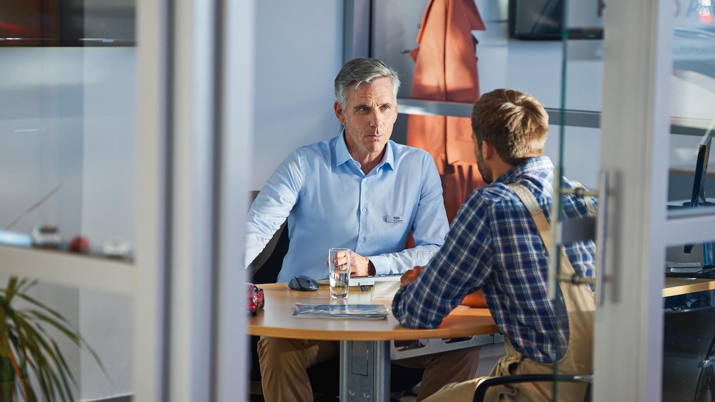 Two people in office