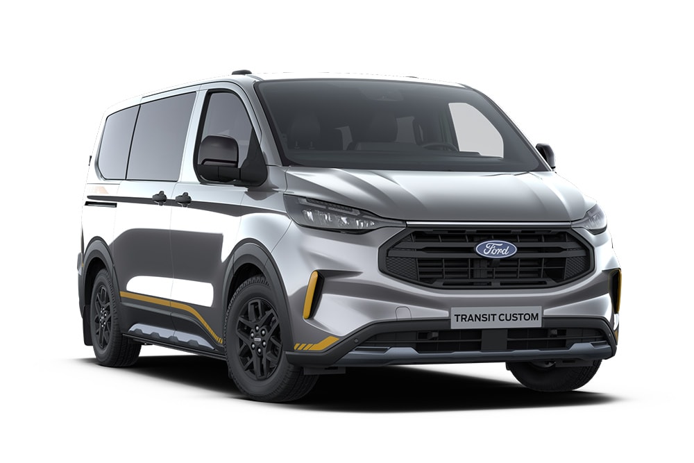 Furgão Ford Transit Custom Trail cinzento-escuro com detalhes em dourado.
