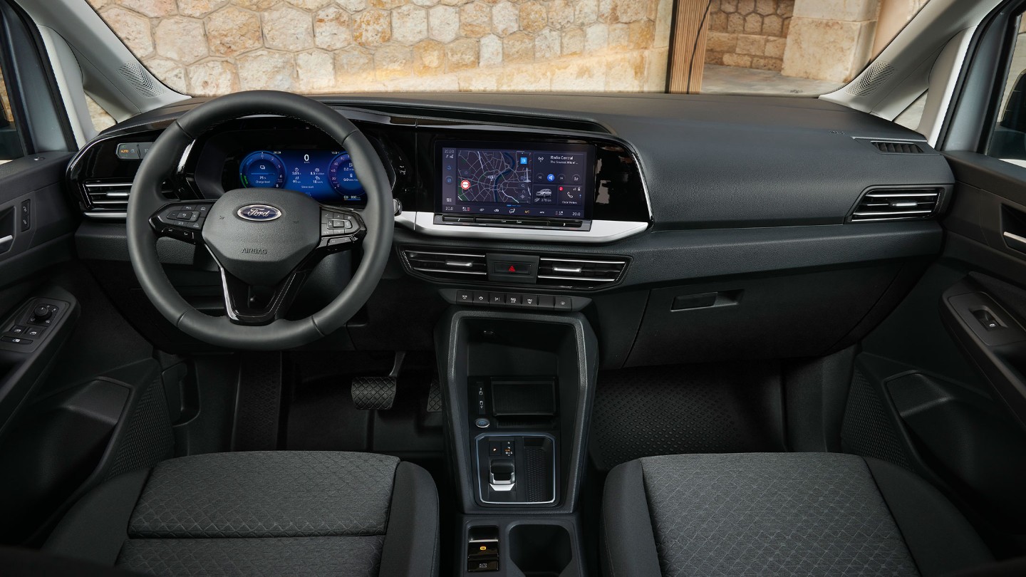 Interior view of a Ford Transit Connect dashboard and steering wheel