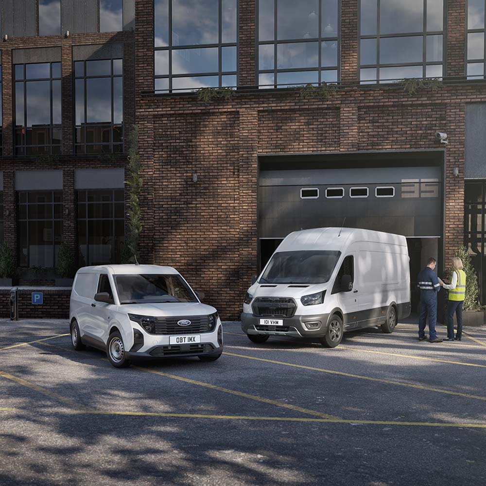 A small fleet including a white Ford Transit van and Transit Connect, parked outside a modern building.
