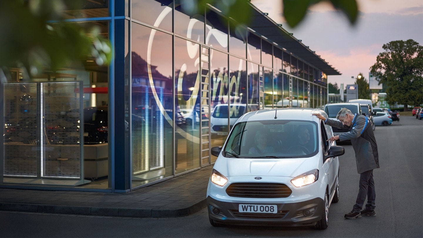 Ford van outside showroom