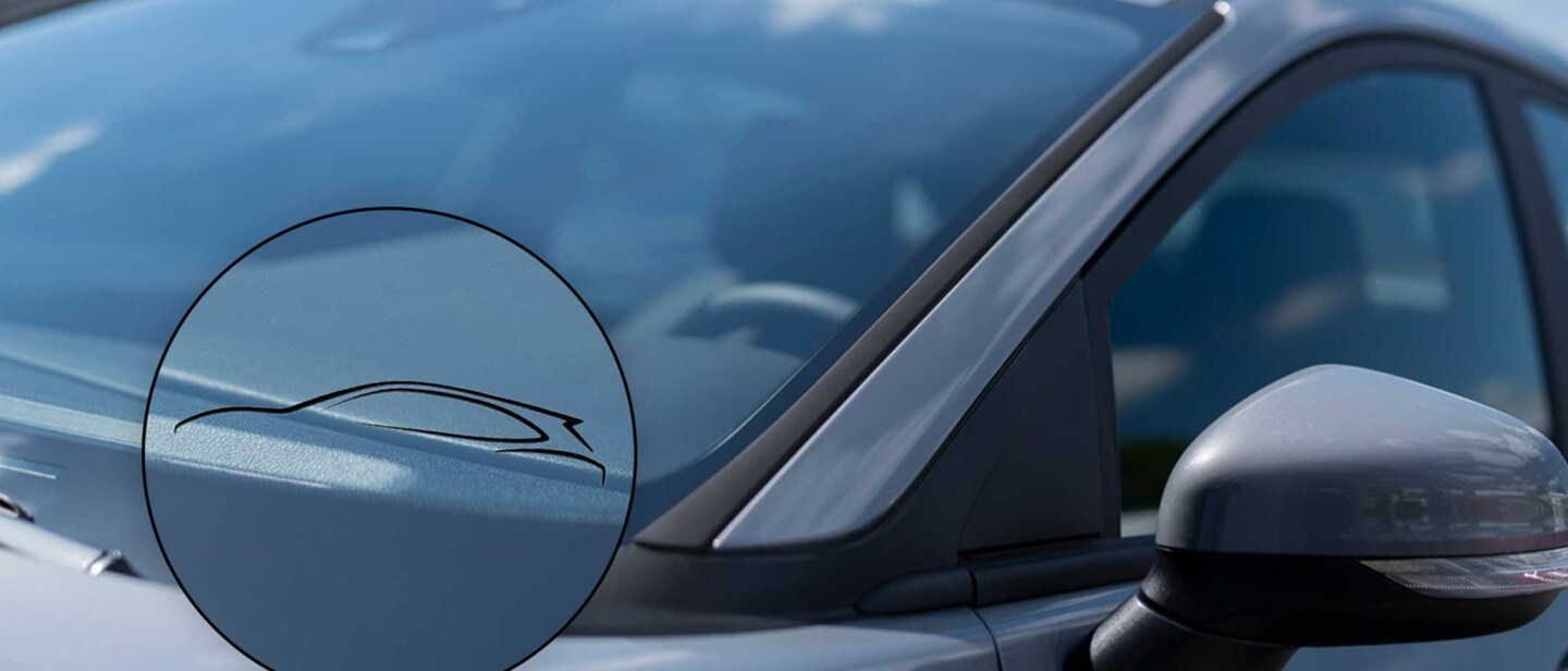 Close -up of a Ford vehicle windscreen and side mirror, highlighting a Ford original windscreen.